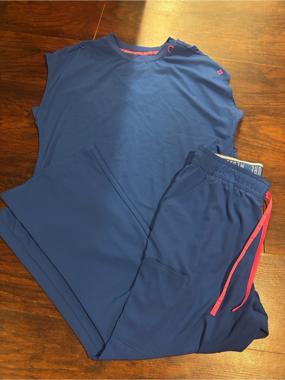 Med Couture Navy Blue Scrub Set with Pink Accent